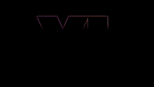 a purple letter vi is lit up in a dark room