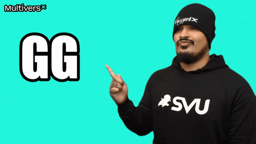 a man wearing a beanie pointing at the word gg on a green background
