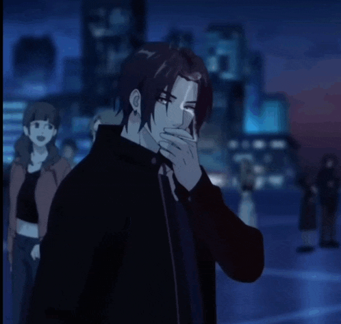 a man in a black jacket is smoking a cigarette in front of a group of people