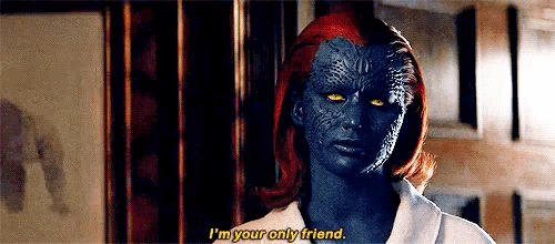 a woman with red hair and blue skin is talking to a man in a room .