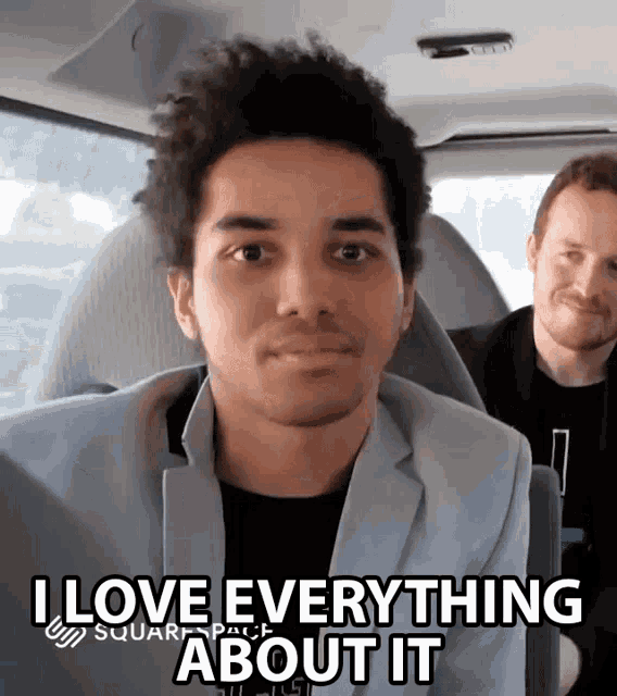 a man in a car with the words i love everything about it above him