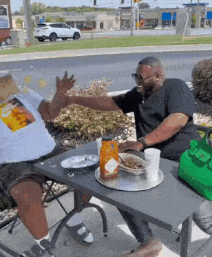 Two People Laughing On Table GIF - Two People Laughing On Table Laugh GIFs