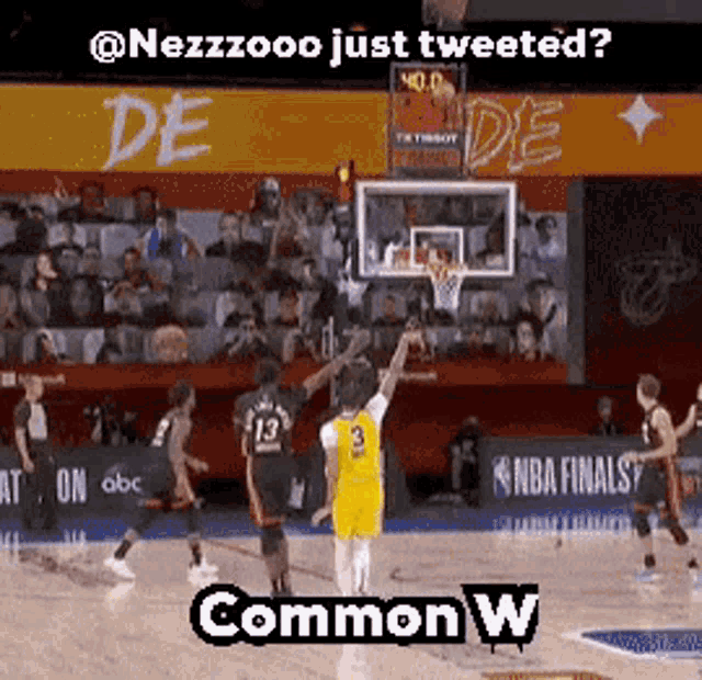 a basketball game is being played on a court with the words " @nezzzooo just tweeted " on the bottom