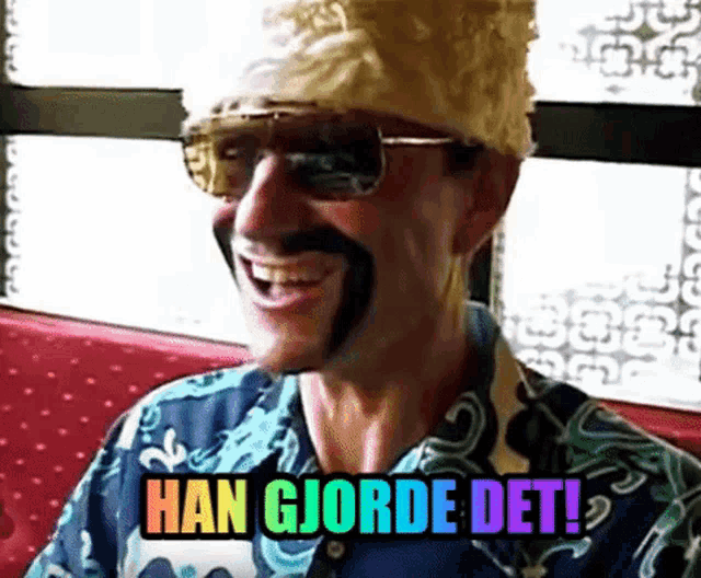 a man wearing sunglasses and a wig with han gjorde det written on it