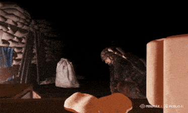 a screenshot of a video game shows a soldier in a dark room with the words minimax and haliuo ai at the bottom