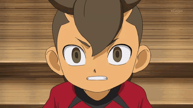 a close up of a child 's face with a tv channel displayed in the corner