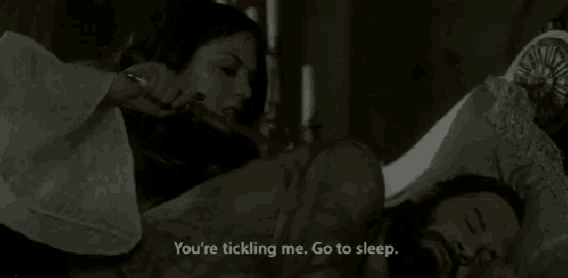a woman is tickling a man with a knife and says " you 're tickling me. go to sleep "