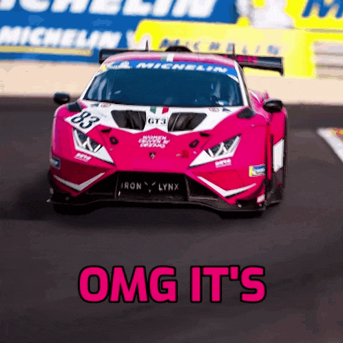 a pink race car with the words omg it 's above it