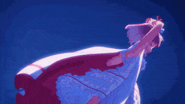 a girl in a blue dress is holding a purple light in her hand .