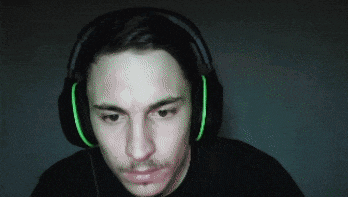 a man wearing headphones with green lights on the side
