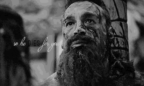 a black and white photo of a man with a beard with the words so he dies for you written below him