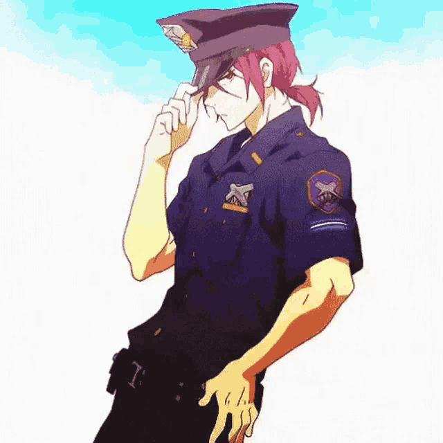 a man in a police uniform is standing with his hands on his hips .