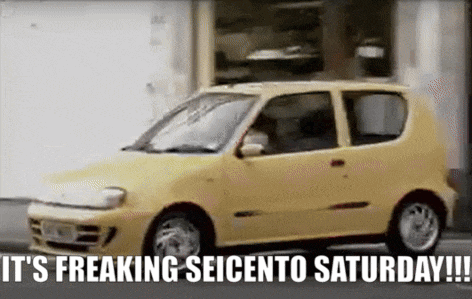 a yellow car with the words " it 's freaking seicento saturday " above it