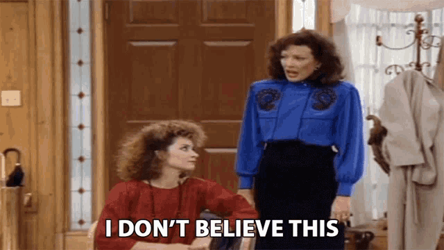 two women are standing next to each other and one of them is saying i don 't believe this