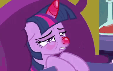 twilight sparkle from my little pony has a red nose and a sad look on her face