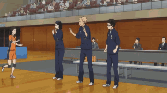 a group of people standing on a basketball court with one wearing a jersey that says ' a ' on it