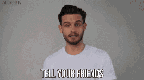 a man with a beard is wearing a white t-shirt and says `` tell your friends '' .