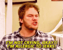 a man in a plaid shirt says i 'm not crying okay ! i 'm allergic to jerks