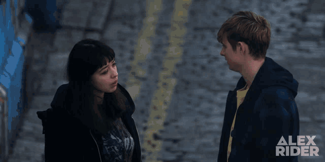a poster for alex rider shows two people talking
