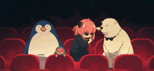 a girl and two penguins are sitting in a theater
