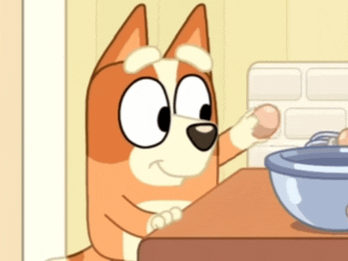 a cartoon dog is reaching for a bowl of eggs