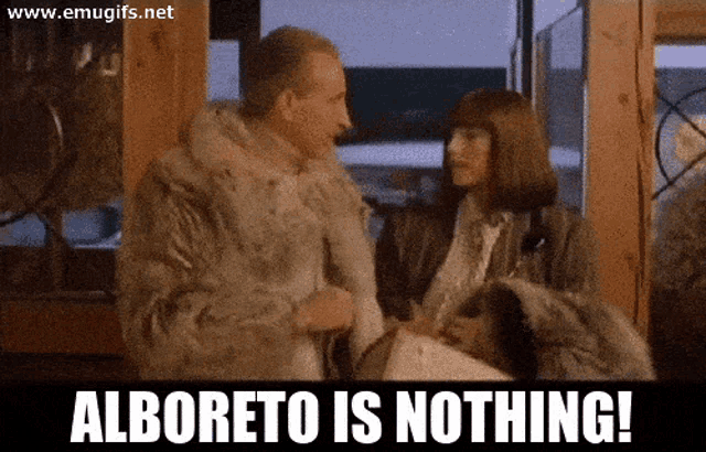 a man in a fur coat and a woman in a fur coat with the words alboreto is nothing