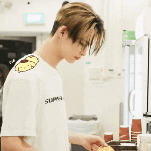 a man wearing a white shirt that says summers