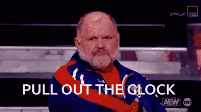 a man with a beard is wearing a red and blue jacket and says pull out the clock