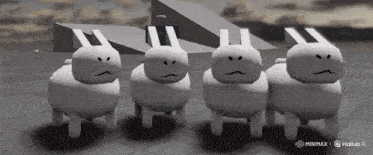 a bunch of white rabbits are standing next to each other with their faces on