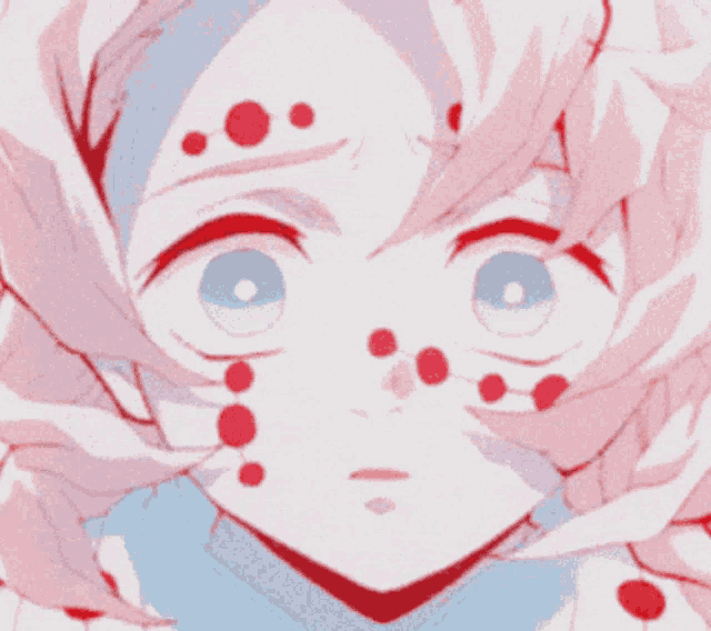 a close up of a person 's face with blood on it