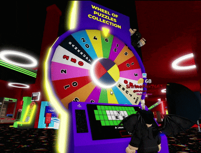 a purple wheel of puzzles collection machine with a person in front of it