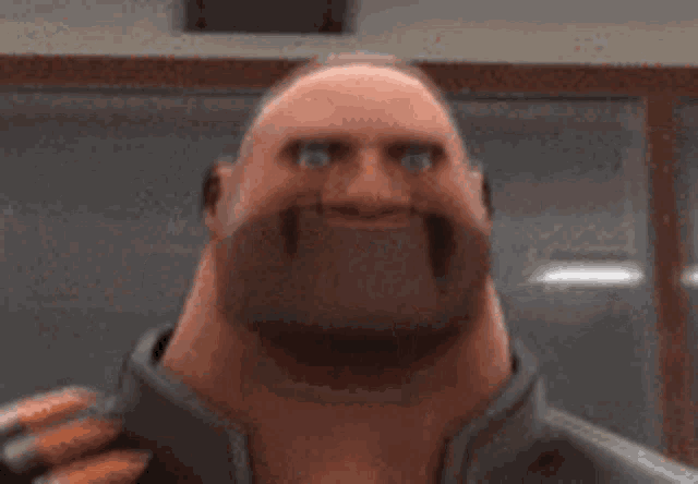 a bald man with a beard is holding a bunch of bullets .