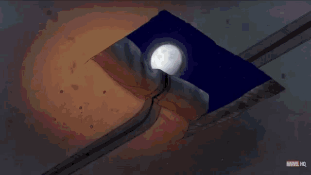 a cartoon of a superhero standing in front of a full moon with marvel hq written on the bottom right
