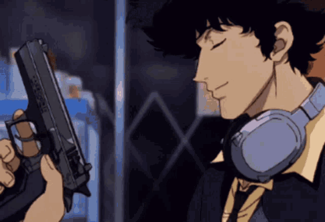 a cowboy bebop character is holding a gun in his hand