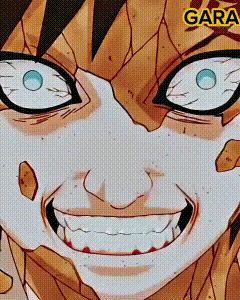 a close up of a cartoon character 's face with sharp teeth and a big smile .