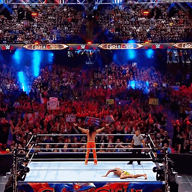 a wrestler in a ring with a crowd behind him and a sign that says cash castle