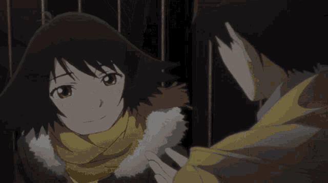 a man and a girl are looking at each other in a dark room