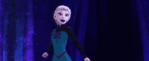 a woman in a blue dress is walking through a dark forest .