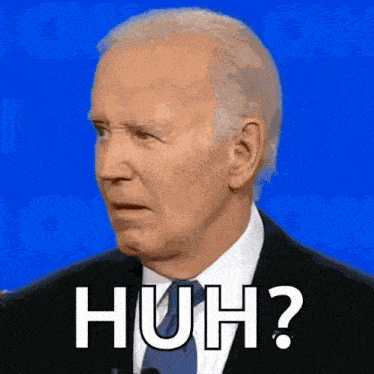 a man in a suit and tie is making a funny face and says huh ? on a blue background .