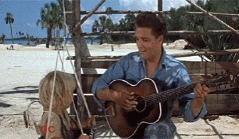 Elvis Playing GIF - Elvis Playing Guitar GIFs