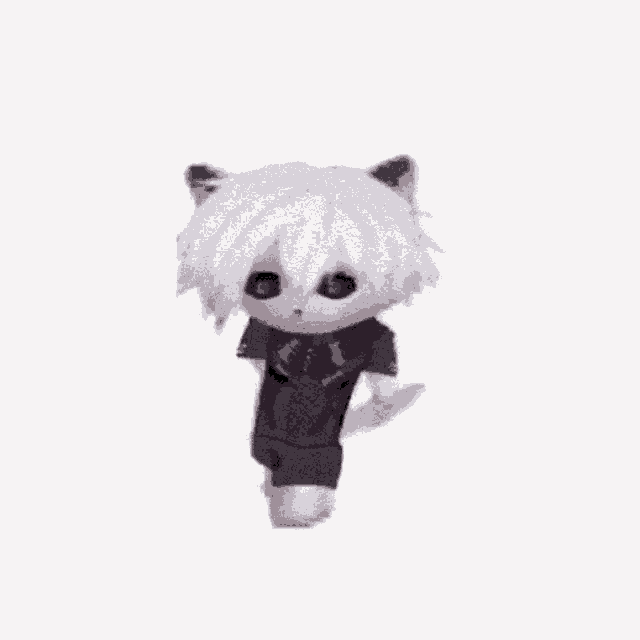 a stuffed animal with red eyes is standing up on a white background .