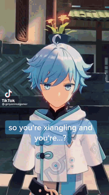 a video of a boy with blue hair says so you 're xiangling and you 're ....
