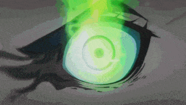 a close up of a person 's eye with a green light coming out of it 's pupil