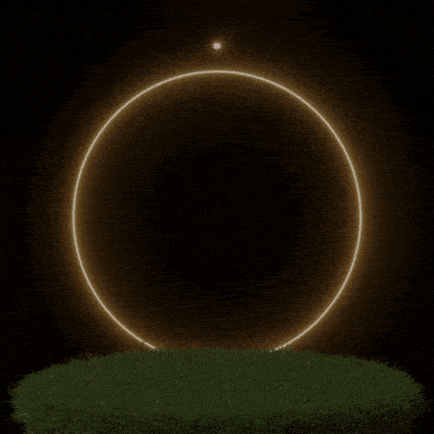 a glowing om symbol is surrounded by a glowing circle