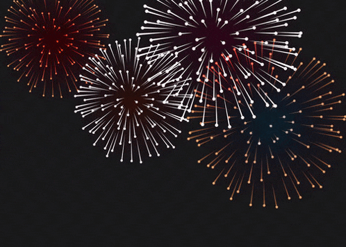 fireworks are displayed in the night sky with a dark background