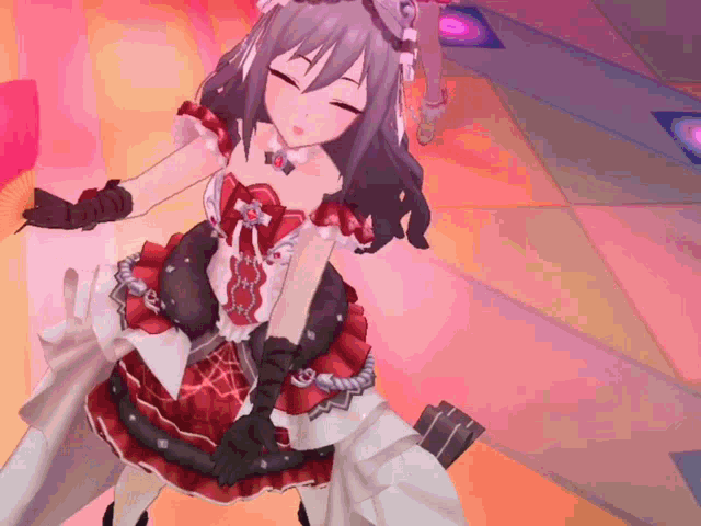 a girl in a red and black dress is dancing on a pink floor