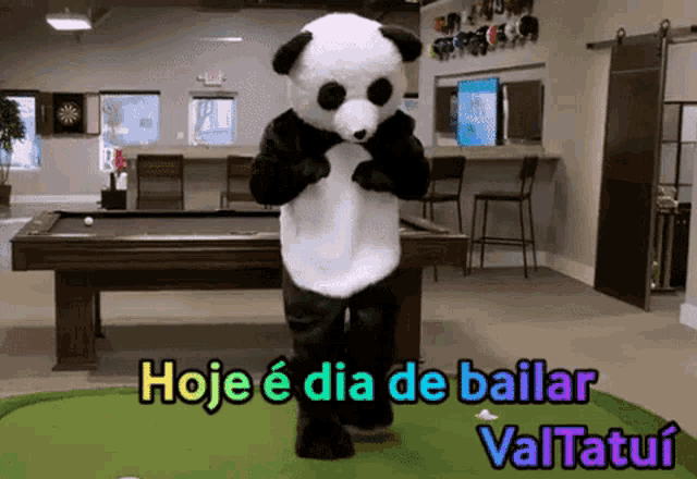 a panda bear is dancing in front of a pool table with the words hoje e dia de bailar valtatui