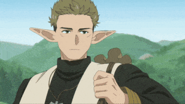 a man with elf ears and a cross on his neck
