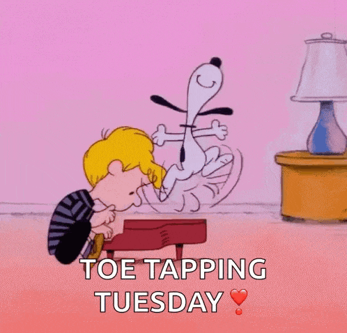 a cartoon of snoopy and charlie brown playing a piano with the words `` toe tapping tuesday '' below them .
