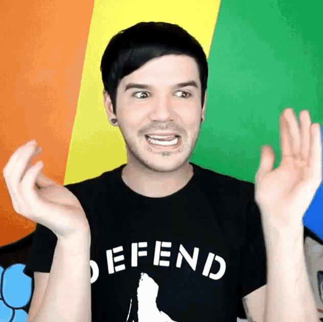 a man wearing a defend t-shirt with a polar bear on it